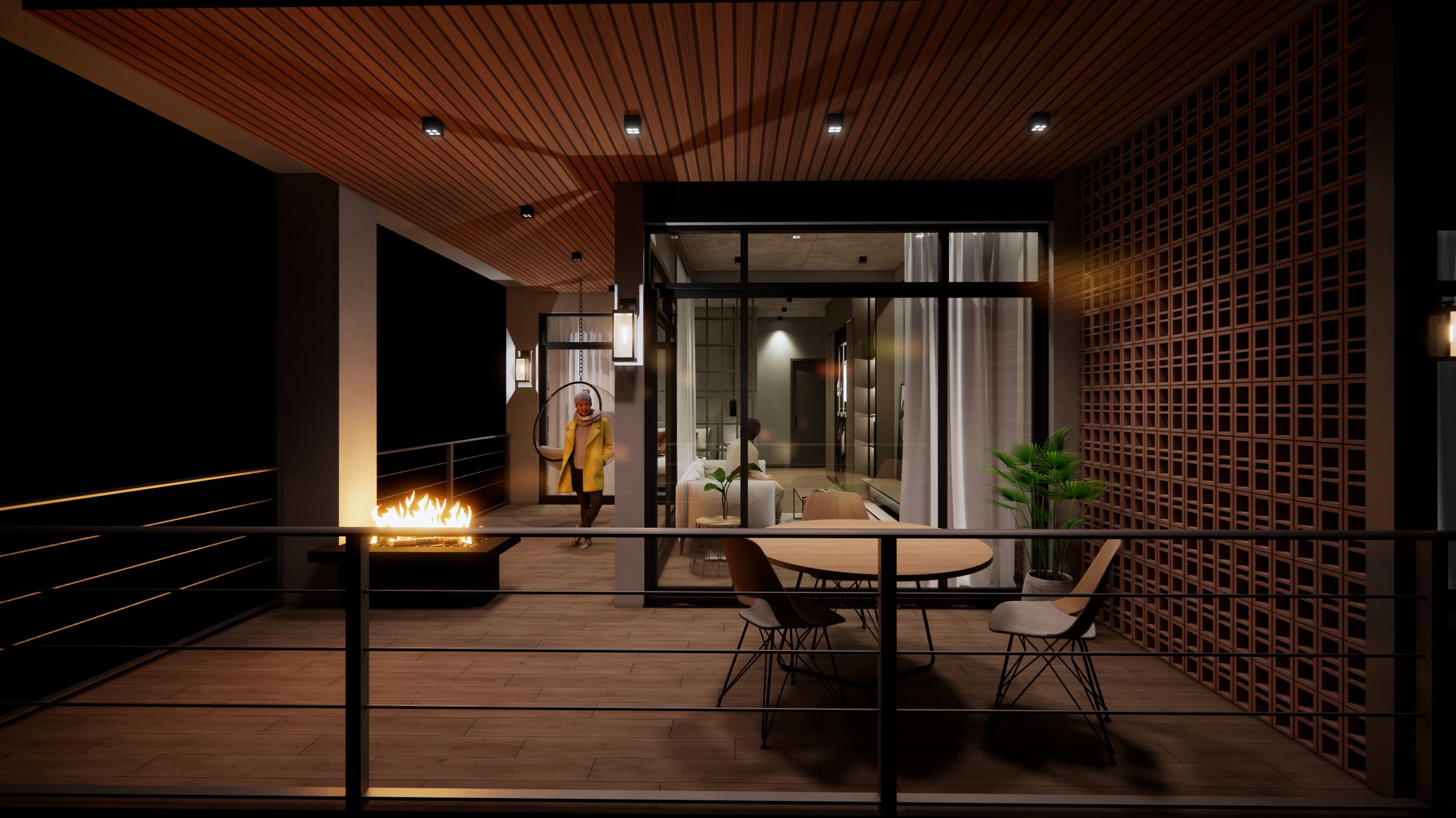 Private terrace at night with an open fire burning